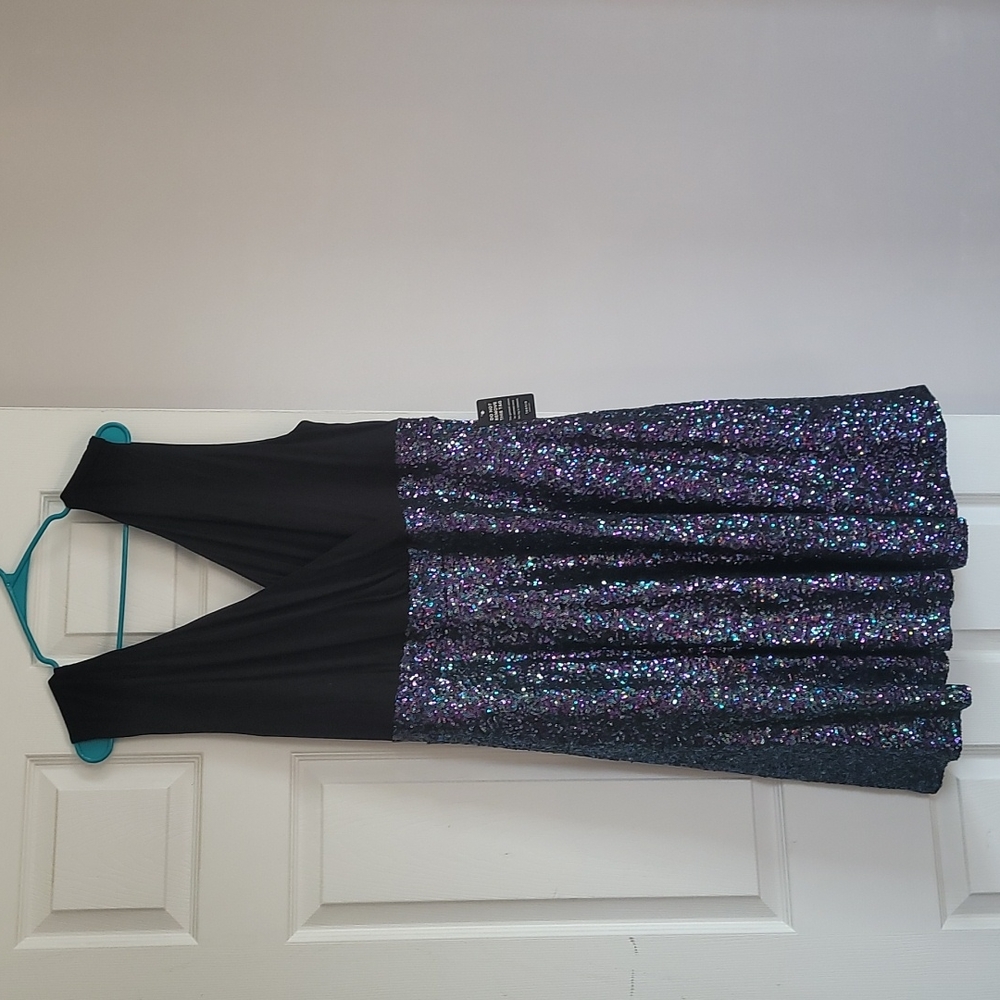 Black top with sequin bottom
